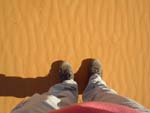 Feet and red sand